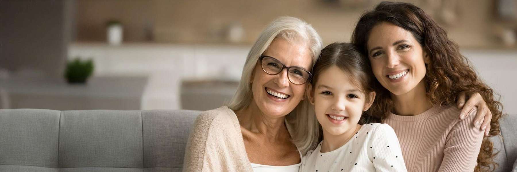 Three generations of women smiling together, south austin tx