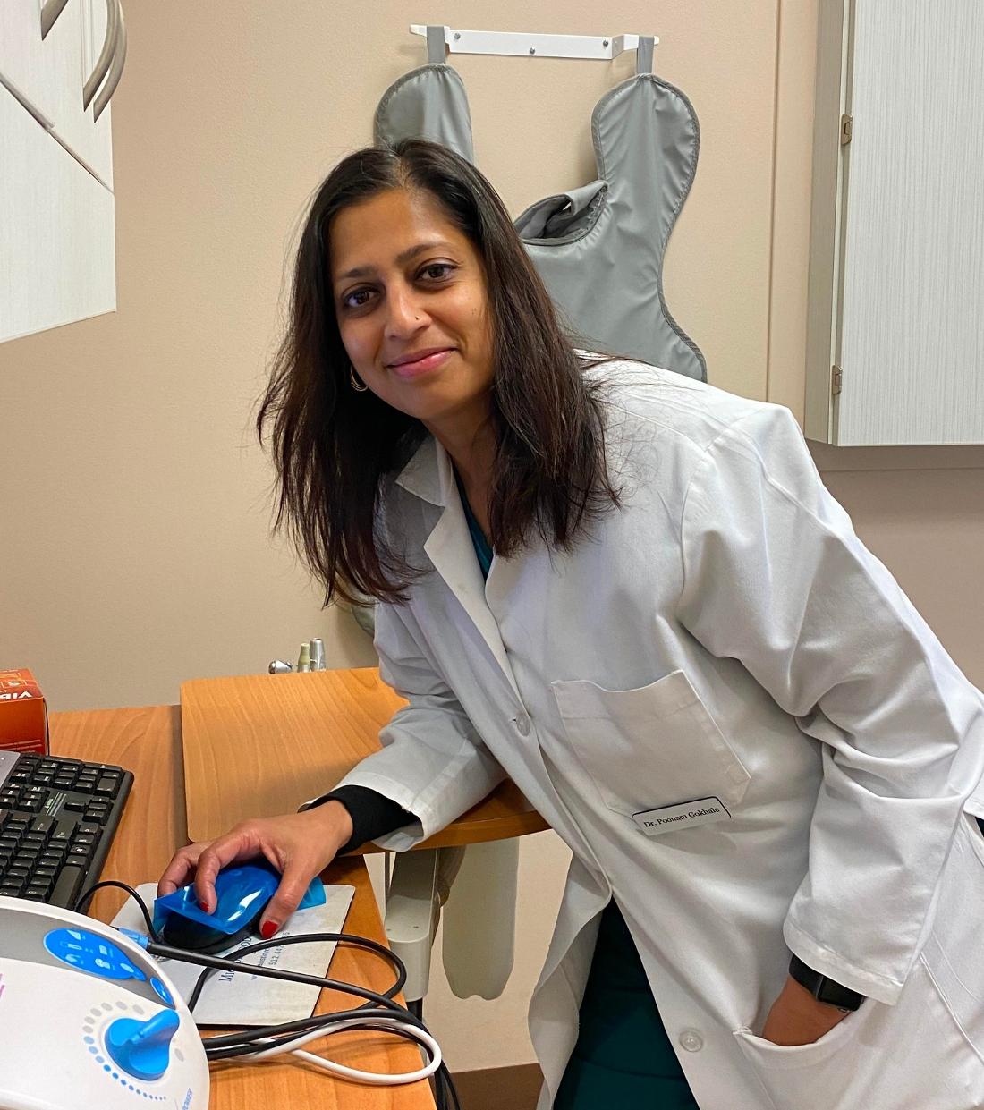 Our Team Dr. Poonam at work at West Creek Dental